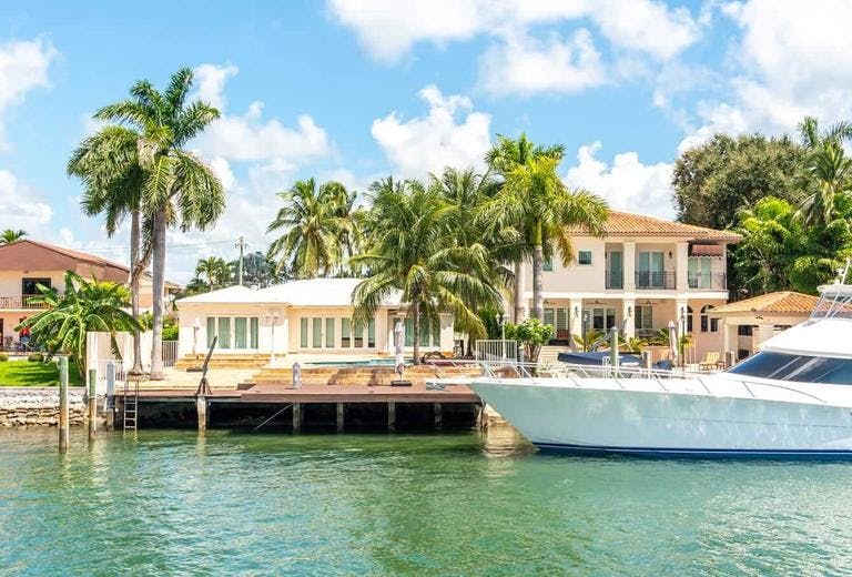 cape coral waterfront villa with yacht on the canal