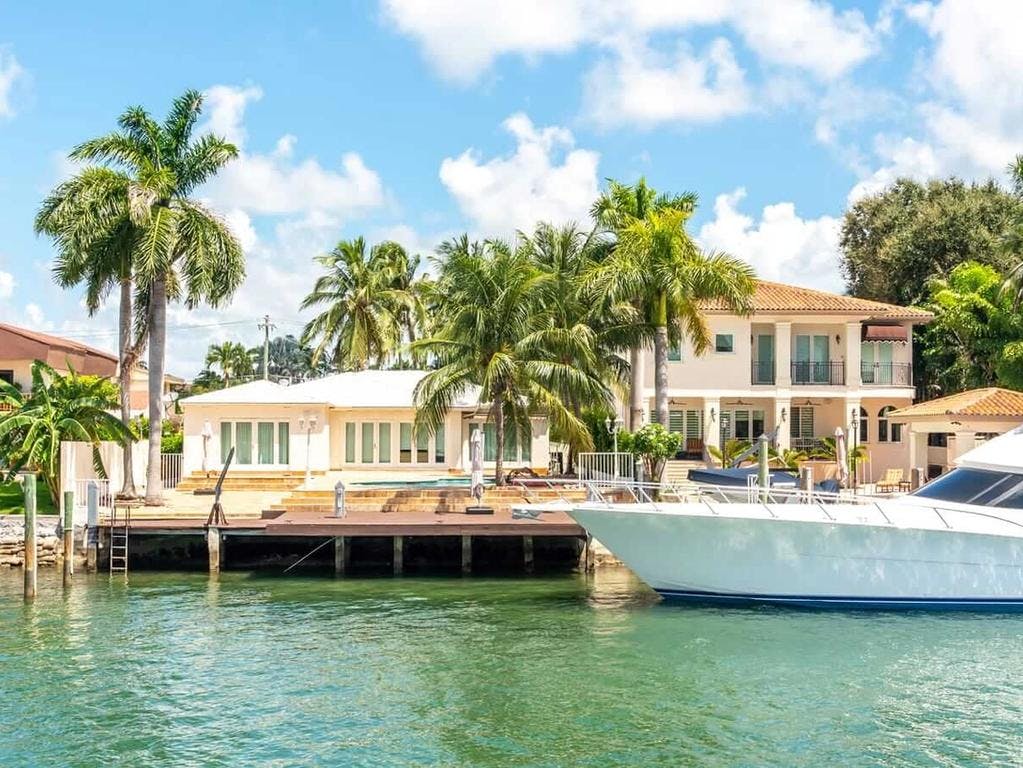 cape coral waterfront villa with yacht on the canal